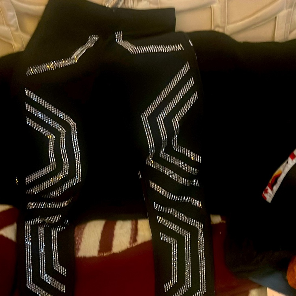 Women sequined pants.  Star studded black.  Awesome for a dress up occasion.